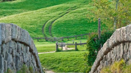 Serene Hilltop Landscape with Fencing Features wallpaper