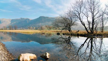 Peaceful Mountain Reflections in Nature's Mirror wallpaper