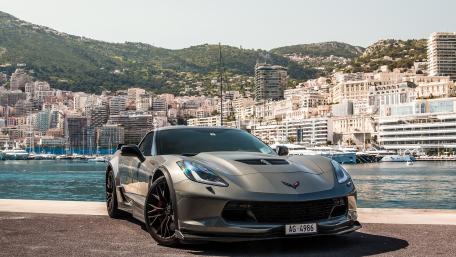 Sleek Chevrolet Corvette by the Waterfront wallpaper