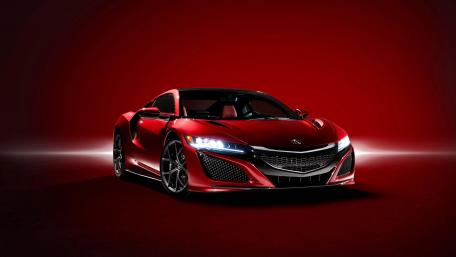 Red Acura NSX Sports Car Wallpaper Displaying Power and Elegance wallpaper