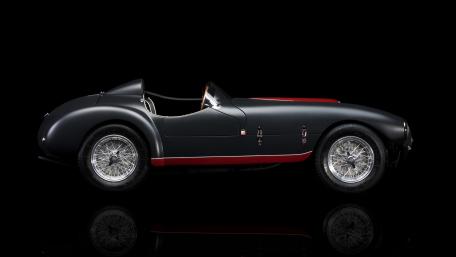 Classic Ferrari 166 on Black Background wallpaper