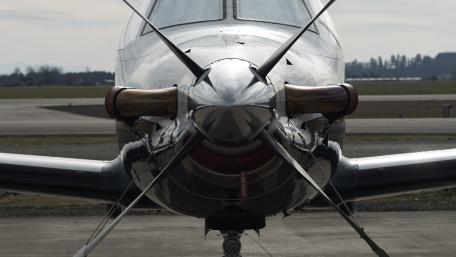 Sleek Propeller Aircraft in Action wallpaper