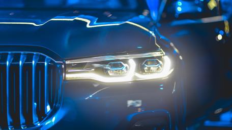 Sleek Blue Headlamp Design for Car Enthusiasts wallpaper