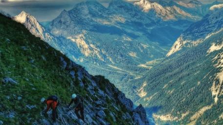 Adventurous Climbers Conquer Majestic Alps Ridge wallpaper