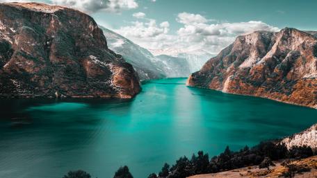 Turquoise Serenity in Majestic Fjord Landscape wallpaper