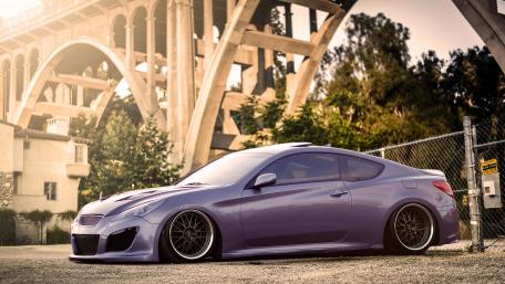 Sleek Hyundai Genesis Coupe Under a Majestic Bridge wallpaper