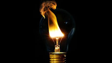 Fiery Glow of an Incandescent Light Bulb wallpaper