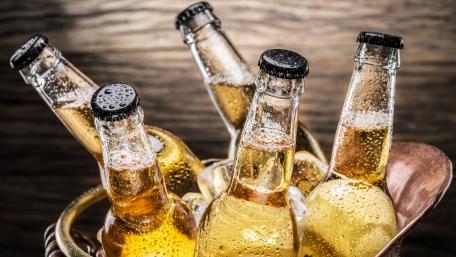 Refreshing Bottles of Corona Beer in a Chilled Bucket wallpaper