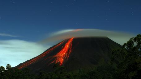 Majestic Nighttime Volcano Eruption wallpaper