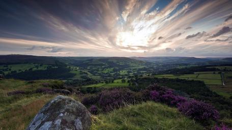 Serene Hillside at Sunset with Vibrant Skies wallpaper