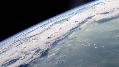 Thunderstorm Unfolding Over Earth From Space wallpaper