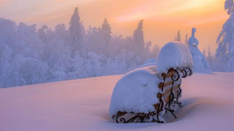 Snow covered bench wallpaper