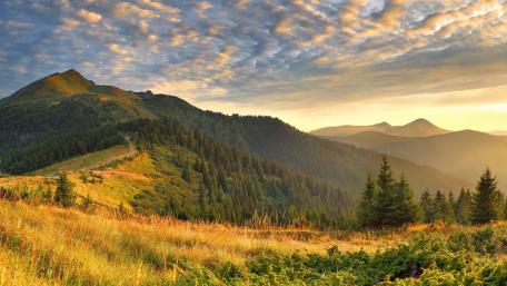 Majestic Sunrise Over Mountain Landscape wallpaper