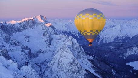 Soaring High Above Majestic Mountains wallpaper