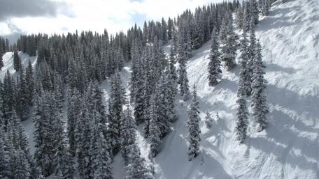 Snowy Mountainside Serenity in Winter Wonderland wallpaper