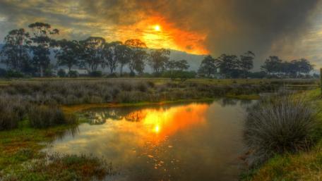 Serene Sunset Over Tranquil River Landscape wallpaper