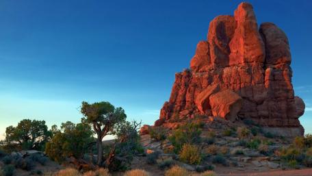 Majestic Rock Formation Against Clear Blue Sky wallpaper