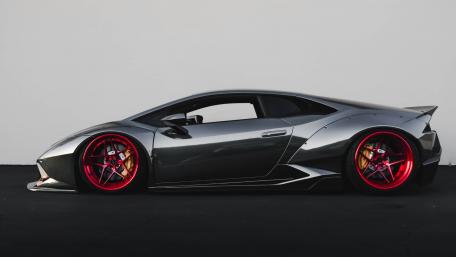 Sleek Lamborghini Huracan with Stunning Red Wheels wallpaper
