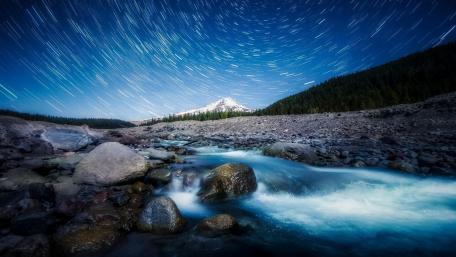 Tranquil River Under Starry Skies wallpaper