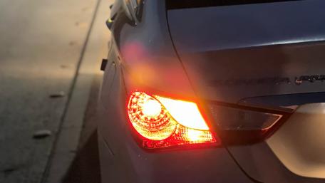 Glowing Tail Light of a Modern Car wallpaper