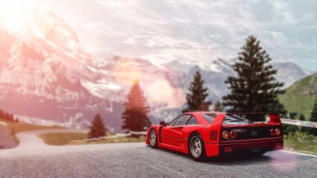 Vintage Ferrari F40 on Scenic Mountain Road wallpaper
