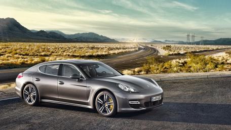 Sleek Porsche Panamera Turbo S on Open Road wallpaper