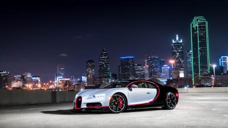 Ultimate Dream Car at Nighttime Cityscape wallpaper