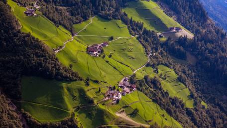 Breathtaking Aerial View of Serene Green Landscapes wallpaper