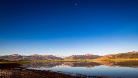 Serene Night Lake Reflection Over Mountains wallpaper