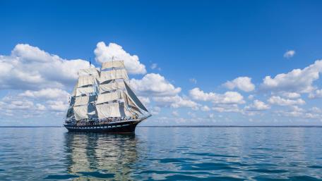 Majestic Masted Ship on Calm Sea wallpaper