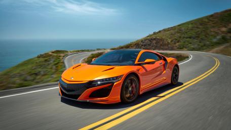 Orange Acura NSX on Coastal Drive wallpaper
