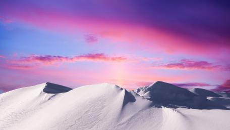 Pink Twilight Over Snowy Peaks wallpaper