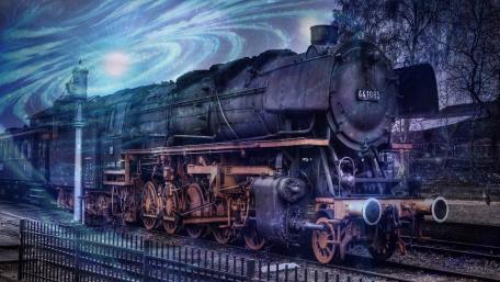 Mystical Steam Locomotive Journeying Through the Cosmos wallpaper