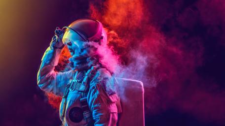 Cosmic Explorer Amidst Nebulous Mystique wallpaper