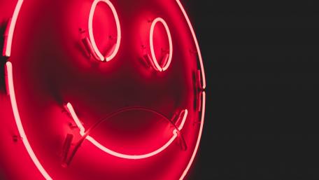 Radiant Red Smiley Faces Light Up the Night wallpaper