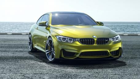 Sleek BMW Coupe by the Oceanfront wallpaper