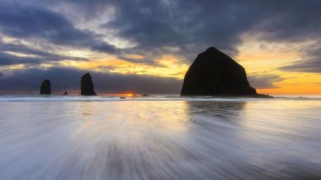 Haystack Rock at sunset wallpaper