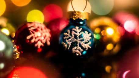 Festive Christmas Baubles with Bokeh Lights wallpaper