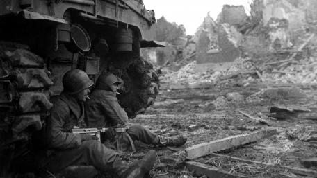 WWII Soldiers Taking Shelter wallpaper