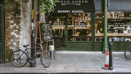 Charming Bakery Street Scene in 4K Quality wallpaper