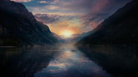 Sunrise Kayak in a Serene Swiss Valley wallpaper