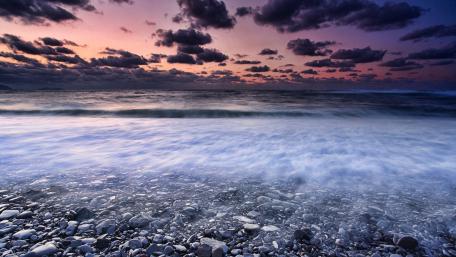 Serene Coastal Sunset Scene In 4K Resolution wallpaper