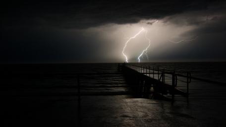 Storm's Fury Over Silent Pier wallpaper