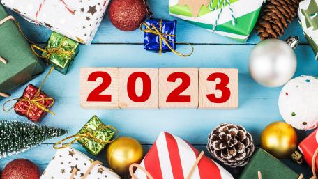 Festive 2023 Celebration Wallpaper with Colorful Gifts wallpaper