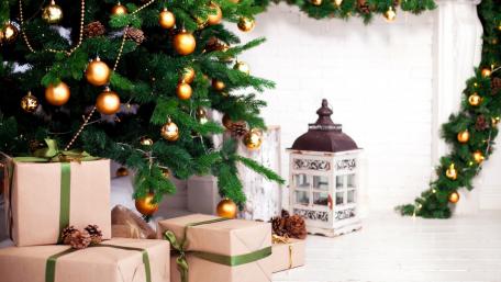 Festive Christmas Tree with Gifts and Ornaments wallpaper