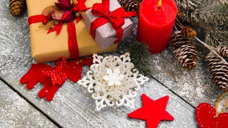 Festive Christmas Gifts on Rustic Wood Planks wallpaper
