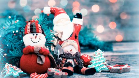 Cheerful Christmas Decorations with Snowman and Santa wallpaper