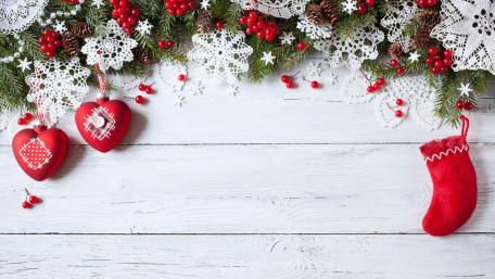 Festive Christmas Decor with Hearts and Stocking wallpaper