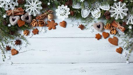 Festive Christmas Decor with Gingerbread and Spices wallpaper
