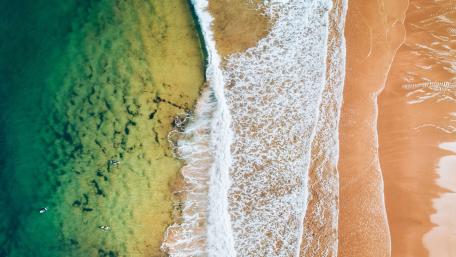 Serene Beach Waves from Above wallpaper